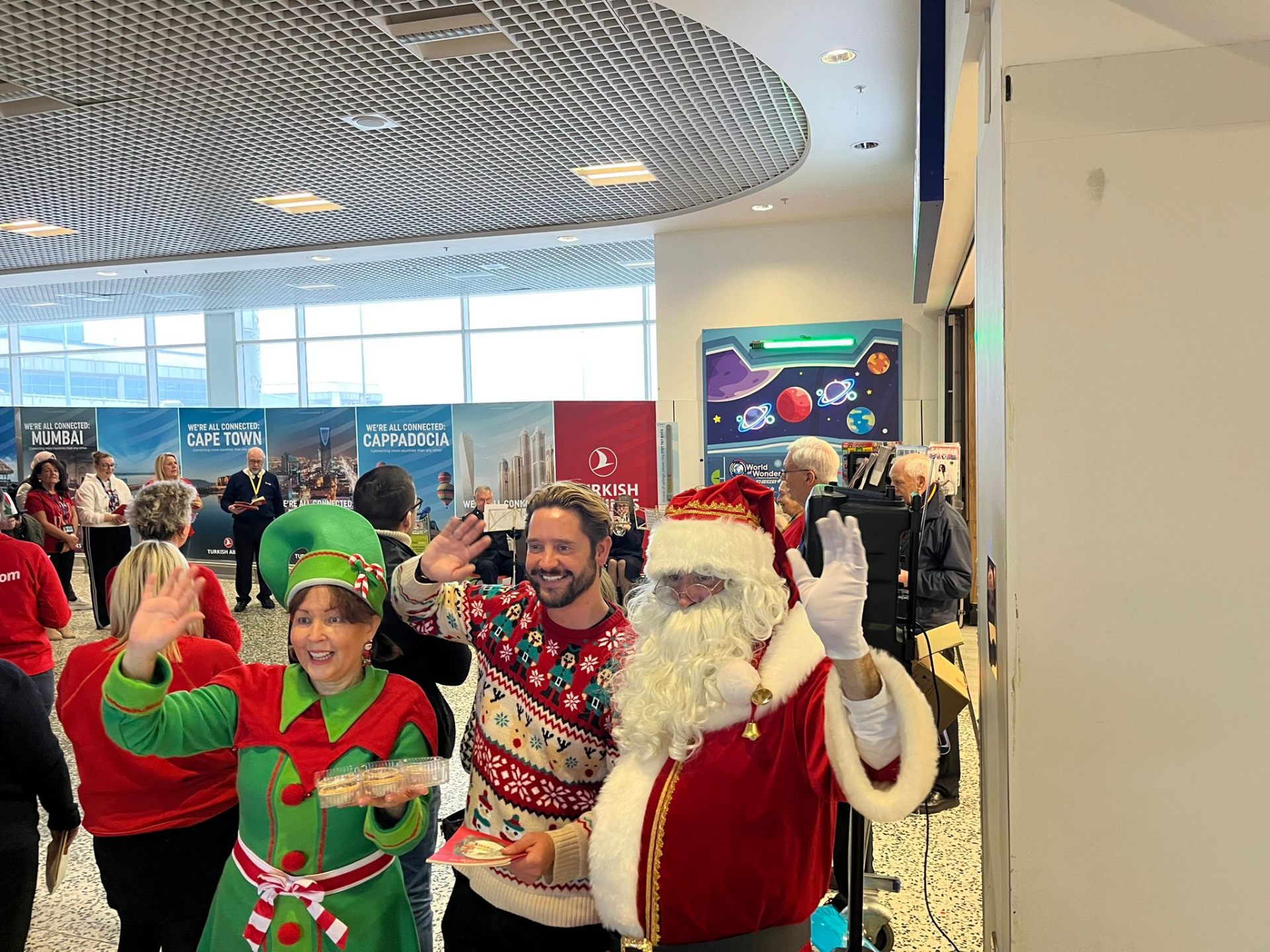 Airport carol singing with volunteers